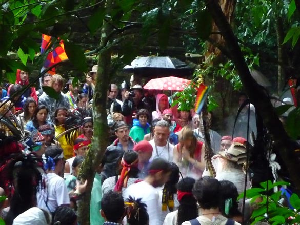 [Photo of the ceremony for the Closing of the Cycle - in the jungle, in the rain]